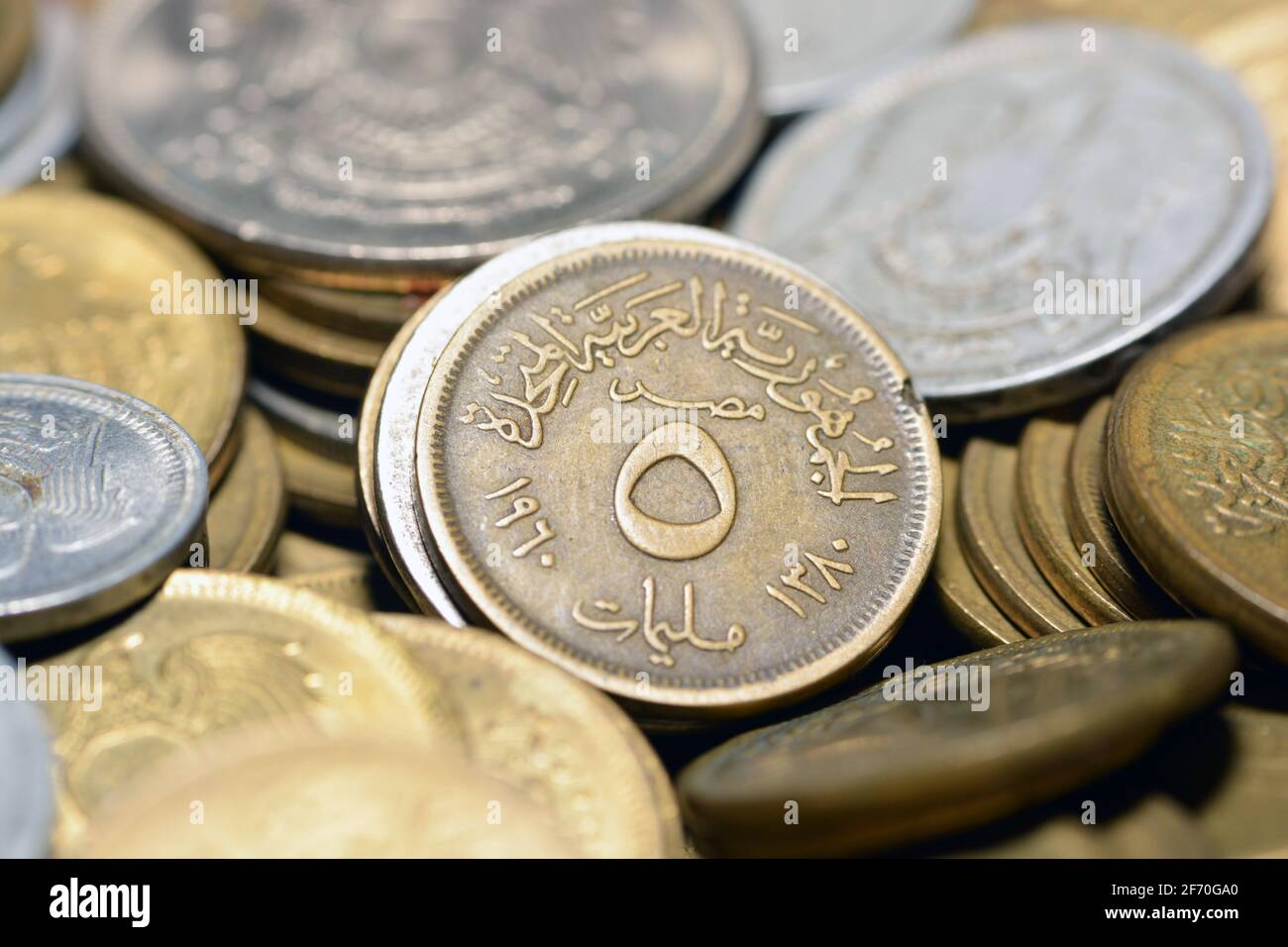 five milliemes coin 1960, old Egyptian money of 5 milliemes coin the currency of the United Arab Republic of Egypt and Syria, Vintage retro Stock Photo