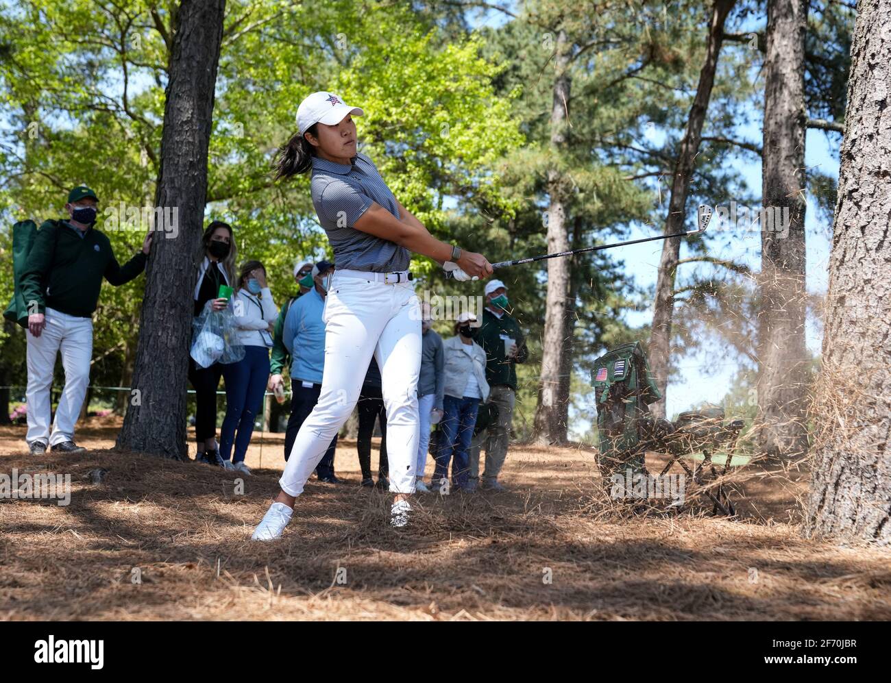 Washington, United States. 03rd Apr, 2021. Auston Kim hits from the rough on the 8th hole during the Augusta National Women's Amateur Tournament at Augusta National in Augusta, Georgia on Saturday, April 3, 2021. Photo by Kevin Dietsch/UPI Credit: UPI/Alamy Live News Stock Photo