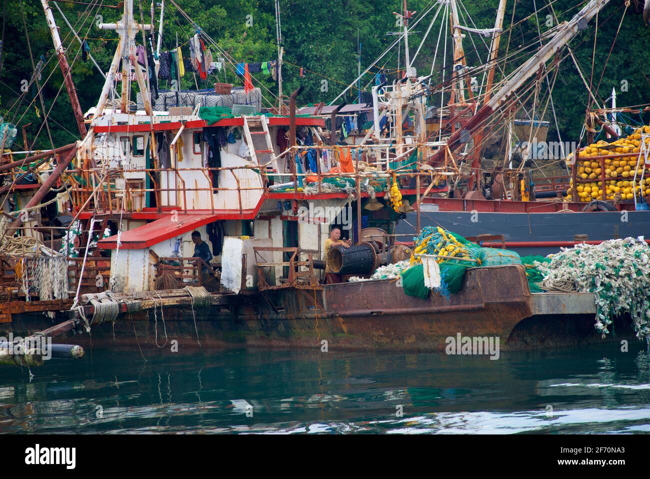 Fishing boats line the coastal of Punta, Cebu Island. On approach to