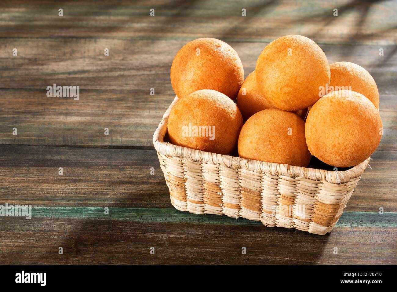 Traditional Colombian buñuelos (Deep Fried Cheese Bread) Text space Stock Photo