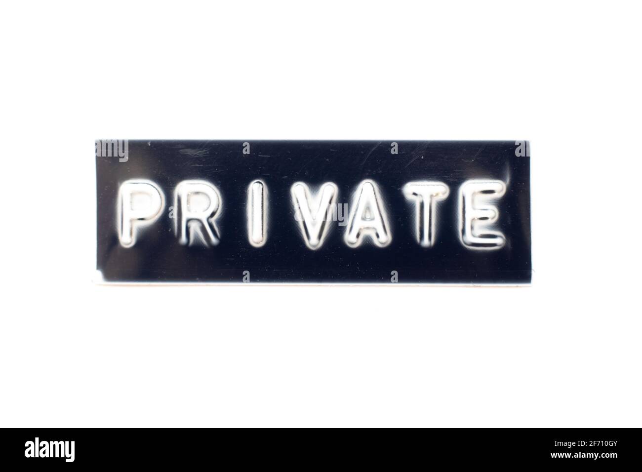 Embossed letter in word private on black banner with white background