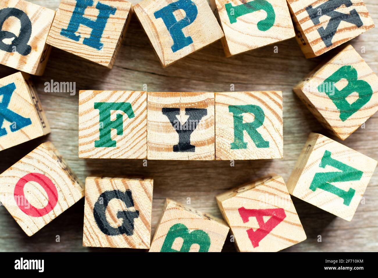Alphabet letter block in word FYR (abbreviation of for your reference) with  another on wood background Stock Photo - Alamy