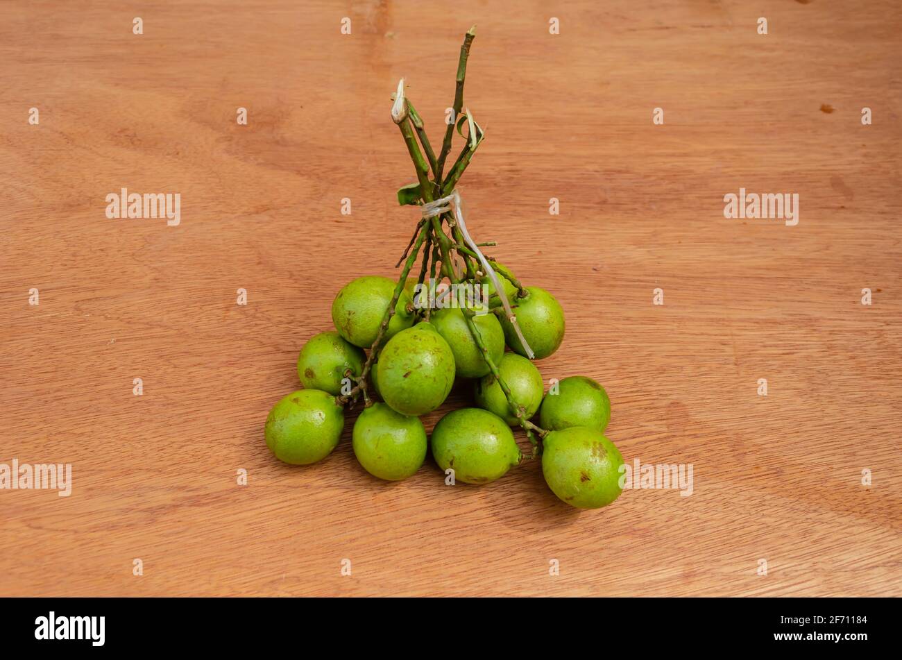 Guineps on Stem Tied Together Stock Photo
