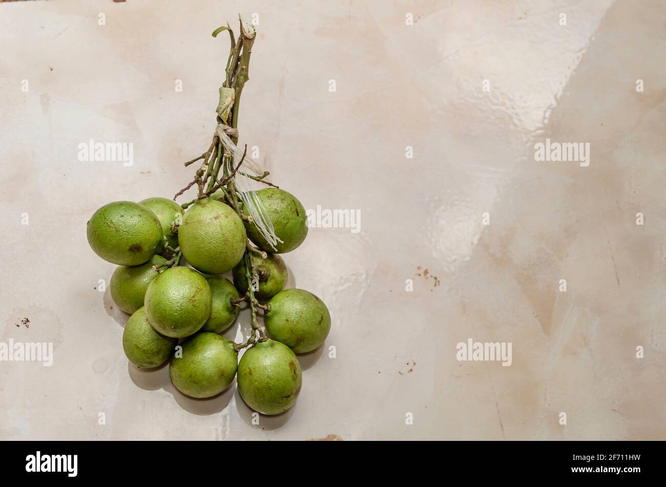 Tied Bunch Of Guineps Stock Photo