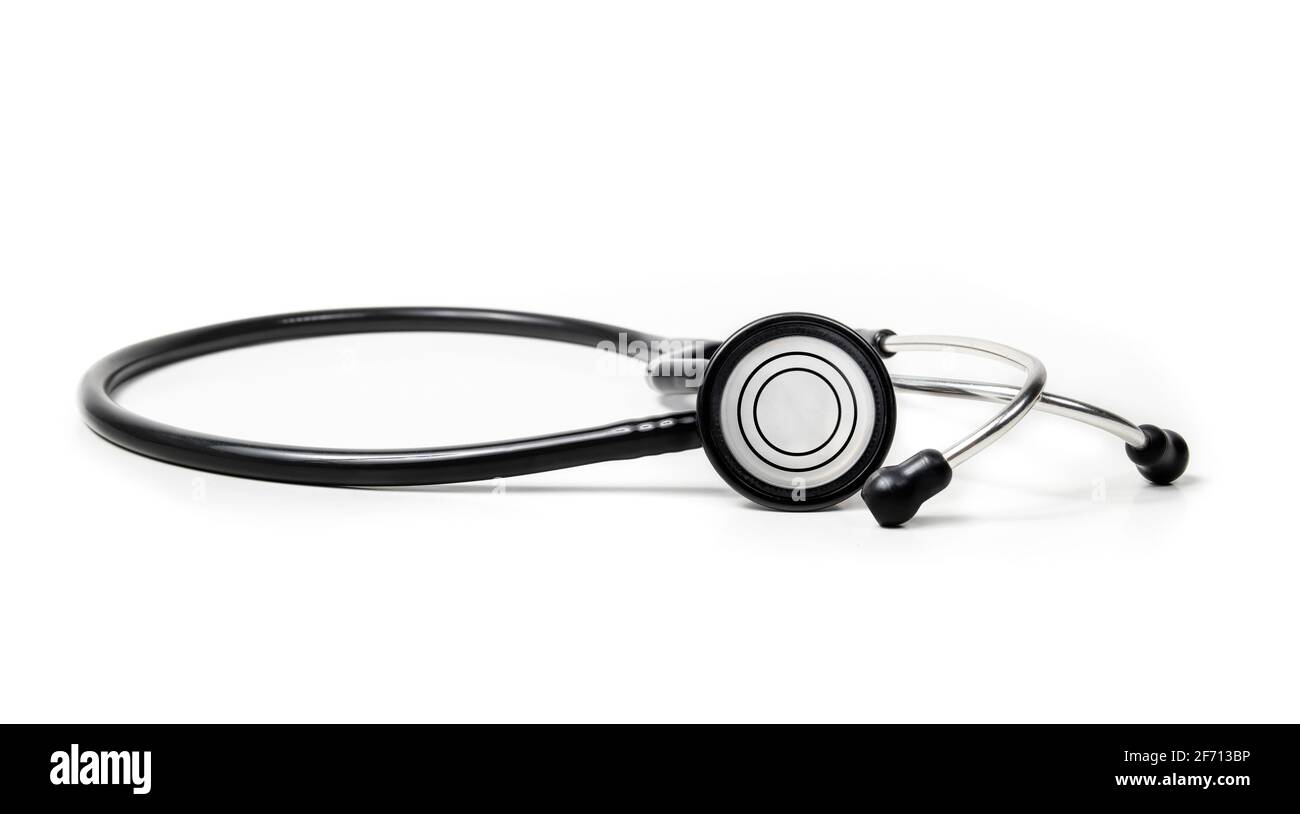 Black Stethoscope, front view of chestpiece. Used by medical professionals and practitioner to hear sounds made by the heart, lungs, and intestines. I Stock Photo