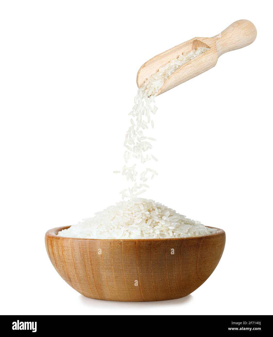 uncooked jasmine rice in wooden bowl isolated Stock Photo Alamy