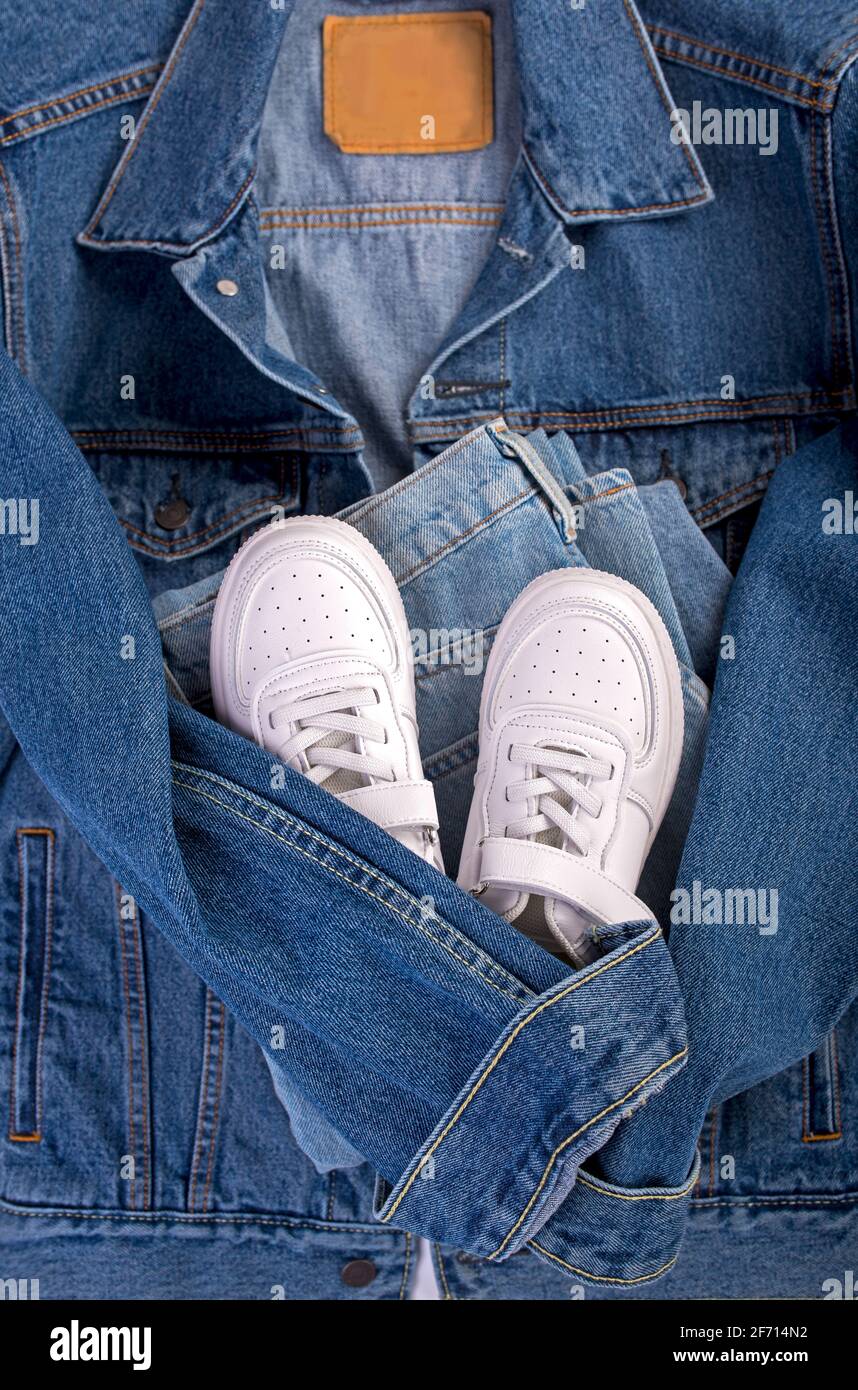 Denim jacket and sneakers hi-res stock photography and images - Alamy