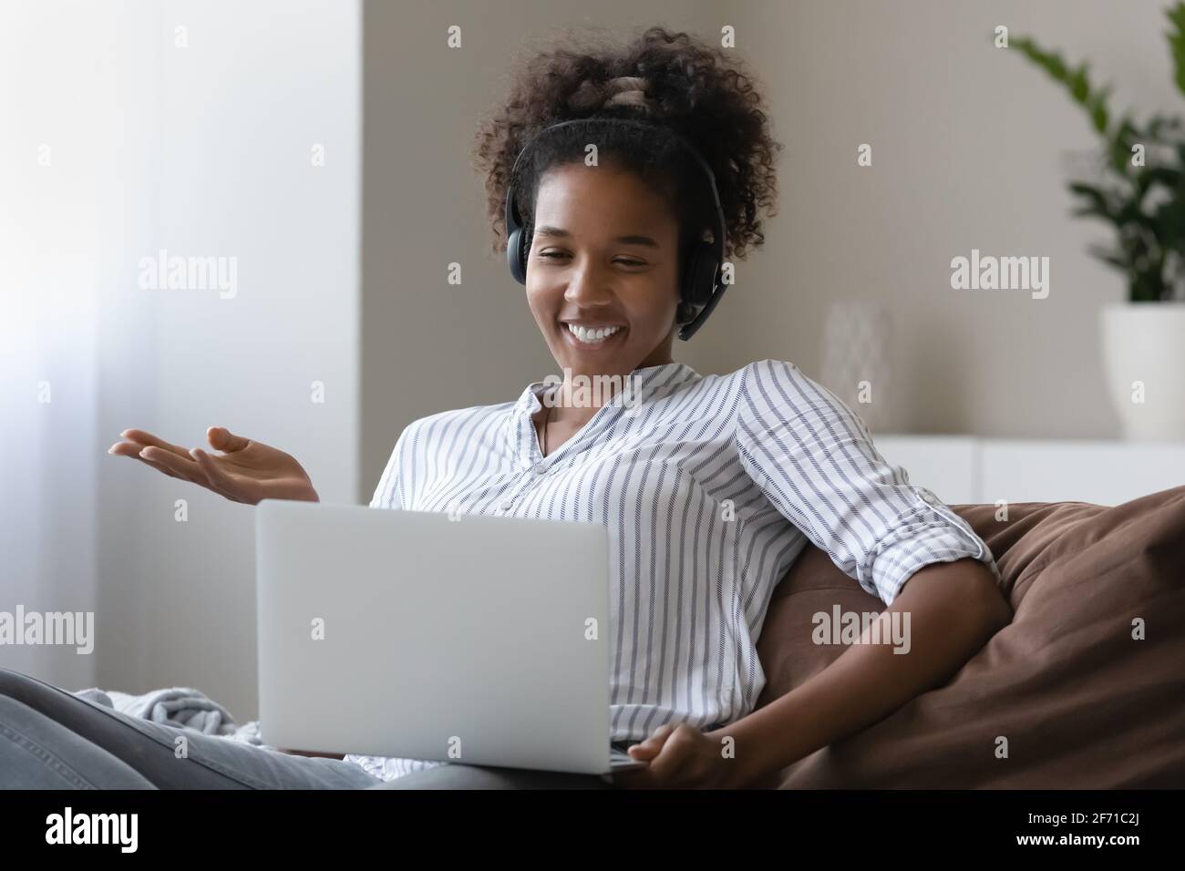 Happy African American woman talk on video call Stock Photo - Alamy