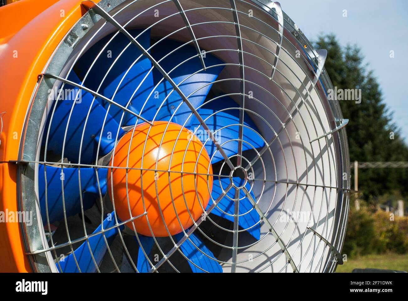 Front part of the snow cannon on a ski slope, detail of the protection mesh and the blades in a duct. Detail of ducted fan of a snow cannon. Stock Photo