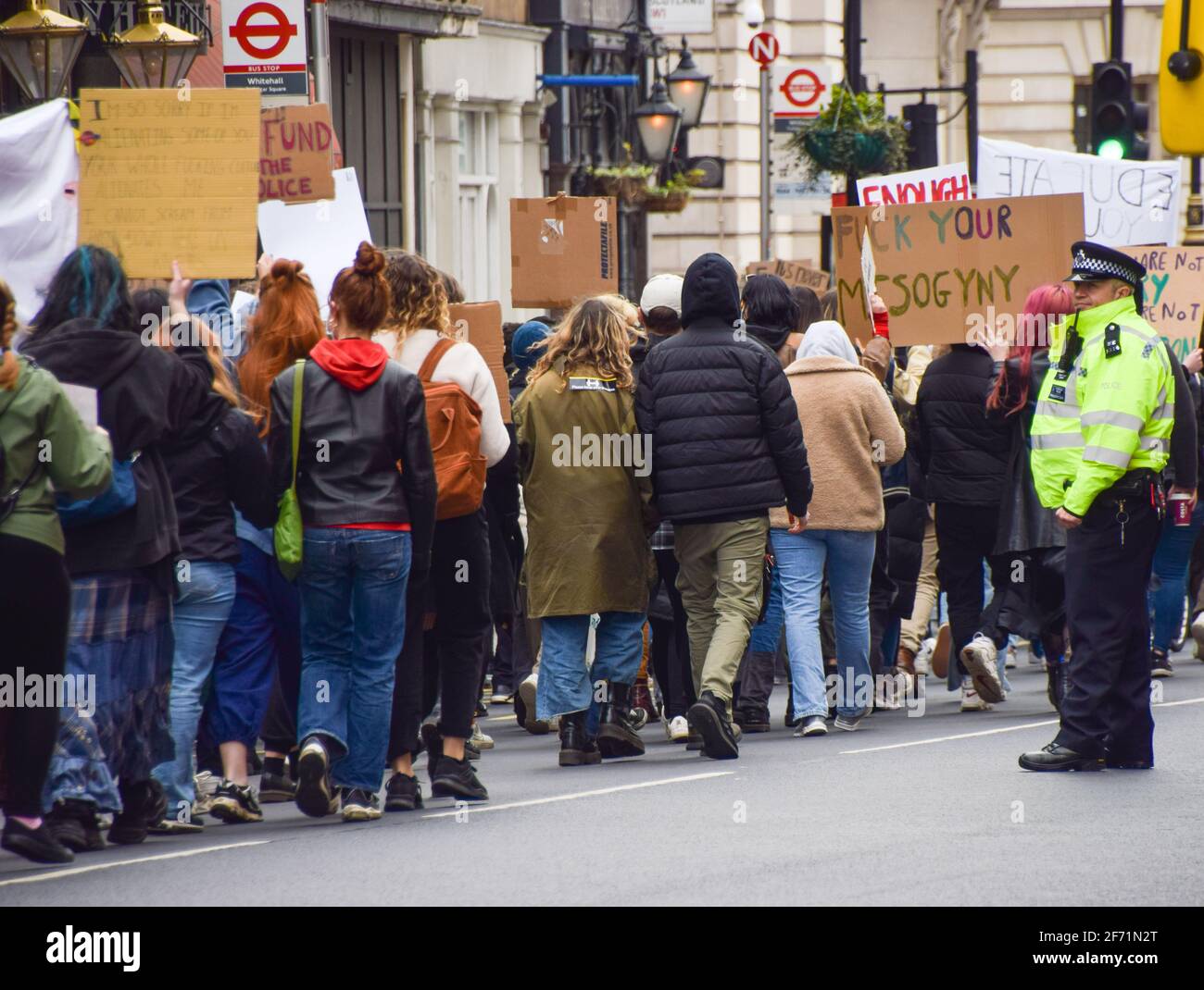 London, United Kingdom. 3rd April 2021. Protesters march down Whitehall towards Parliament Square. Hundreds of demonstrators gathered in Central London for The 97% March to protest against harassment of women. Stock Photo