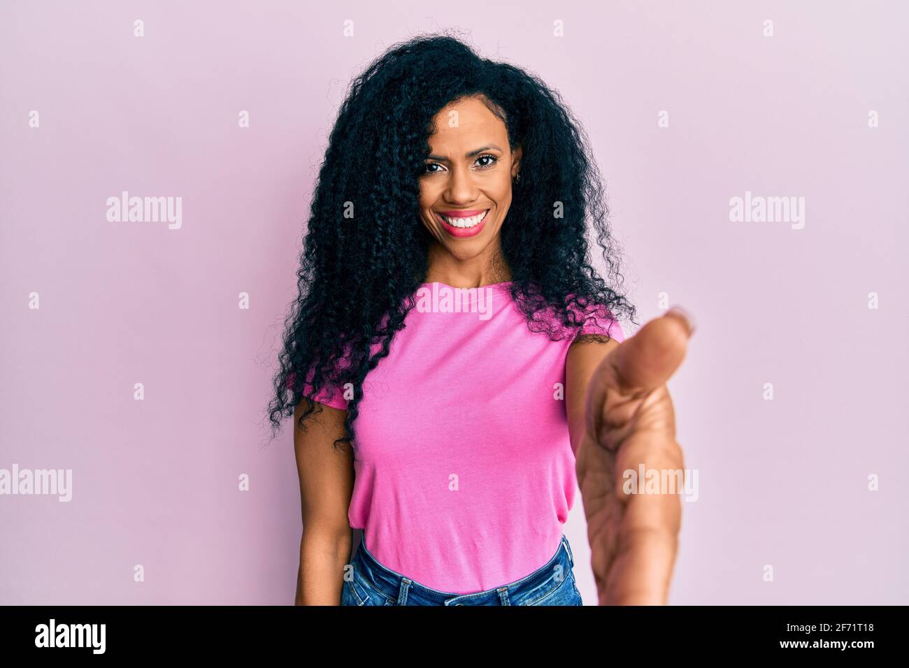 Middle age african american woman wearing casual clothes smiling ...