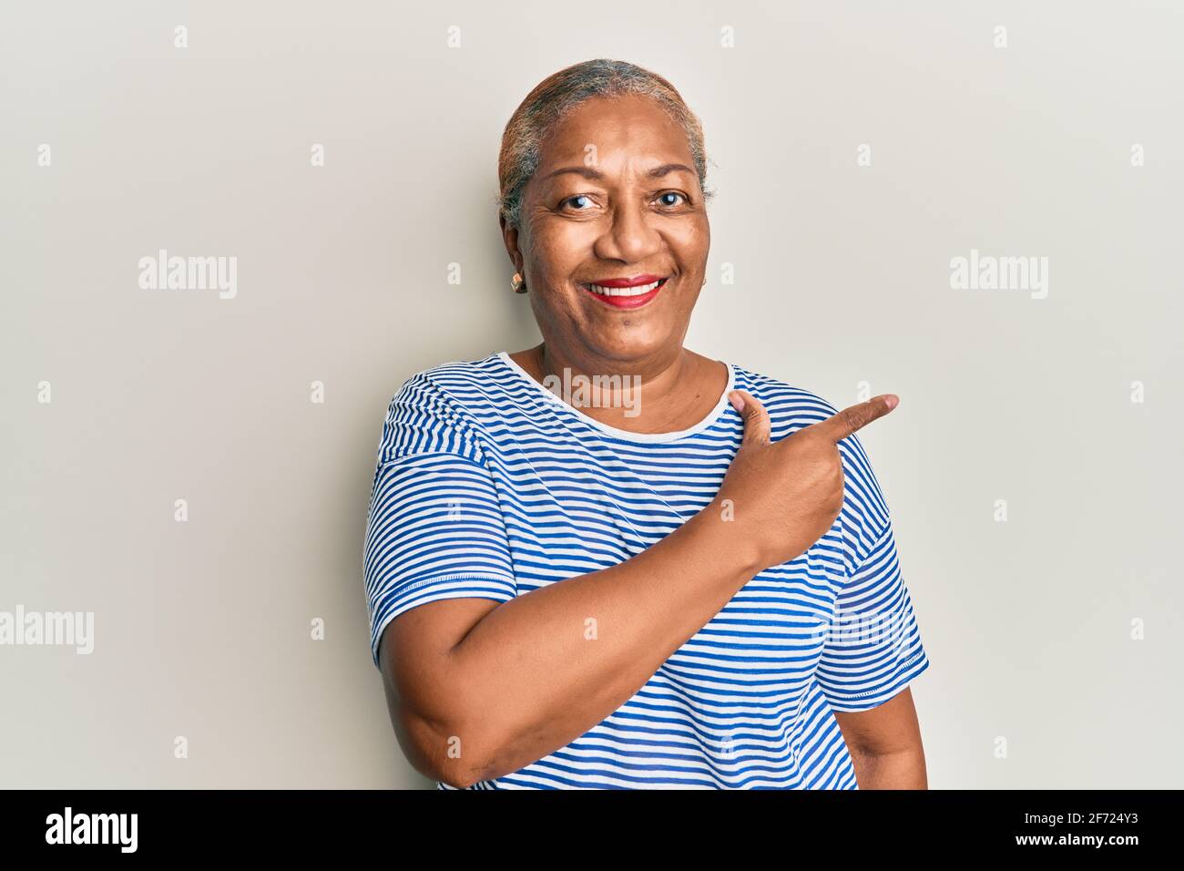 Senior african american woman wearing casual clothes smiling cheerful ...