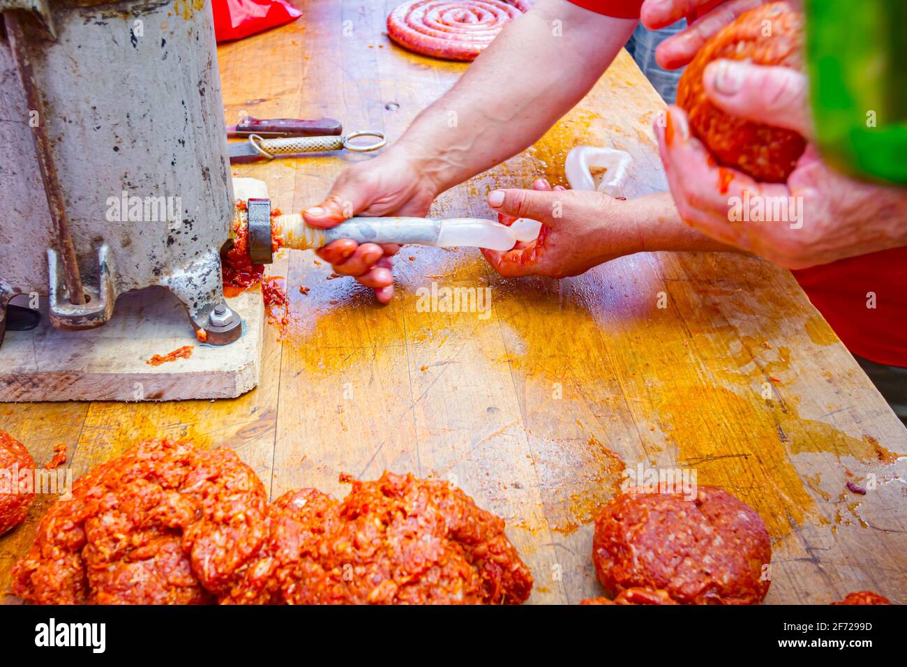 Fill up pig intestines to make sausage with machine for handmade