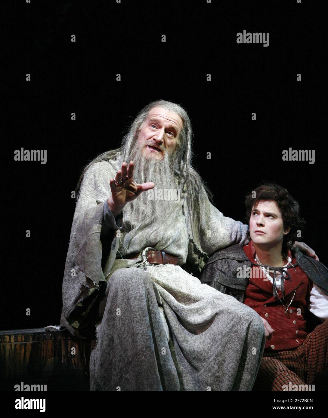 Mines of Moria - l-r: Malcolm Storry (Gandalf), James Loye (Frodo) in THE LORD OF THE RINGS at the Theatre Royal Drury Lane, London WC2  19/06/2007  based on the books by J R R Tolkien  book & lyrics: Shaun McKenna & Matthew Warchus  music: A R Rahman, Varttina & Christopher Nightingale  set & costume design: Rob Howell  lighting design: Paul Pyant  choreography: Peter Darling  director: Matthew Warchus Stock Photo