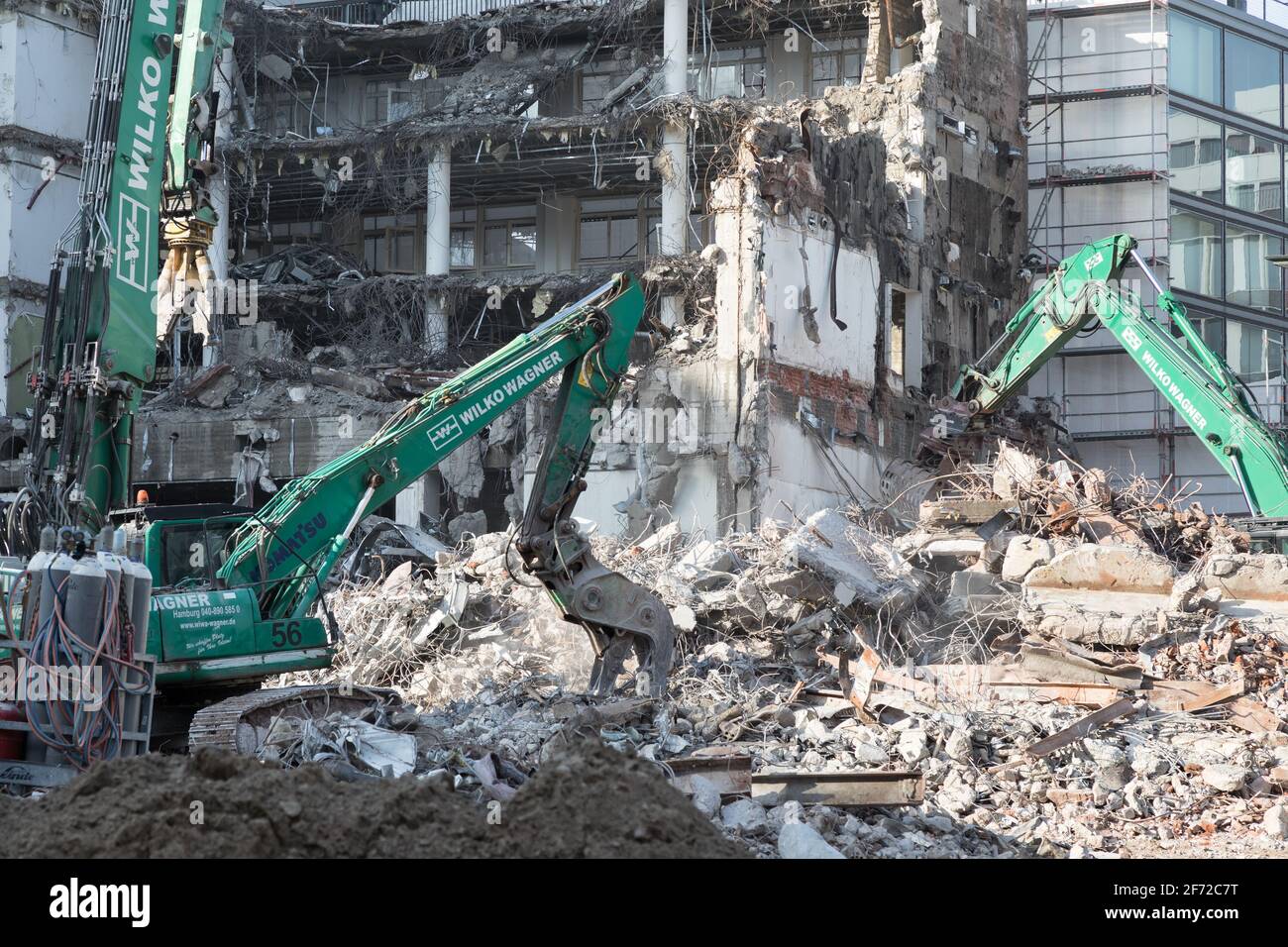demolition of a building with excavators Stock Photo - Alamy