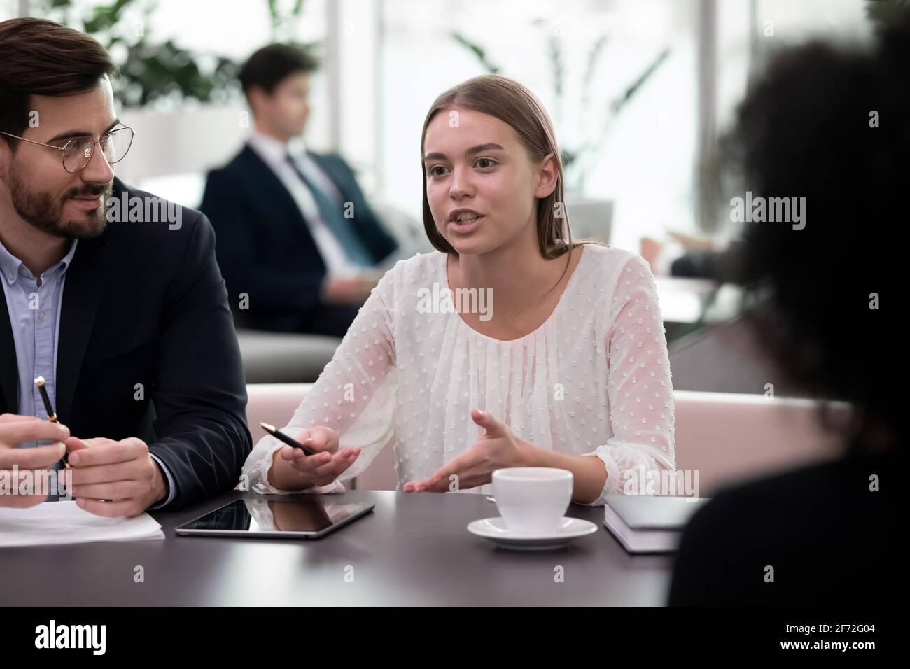 Diverse businesspeople have team meeting with clients Stock Photo