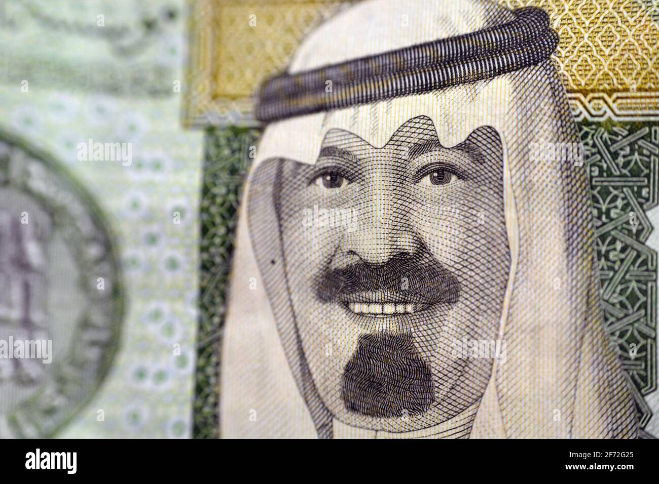 photo of King Abdullah Bin AbdulAziz, the former king of Saudi Arabia on the banknote of 1 Saudi riyal , the currency of Saudi kingdom , a close-up. Stock Photo