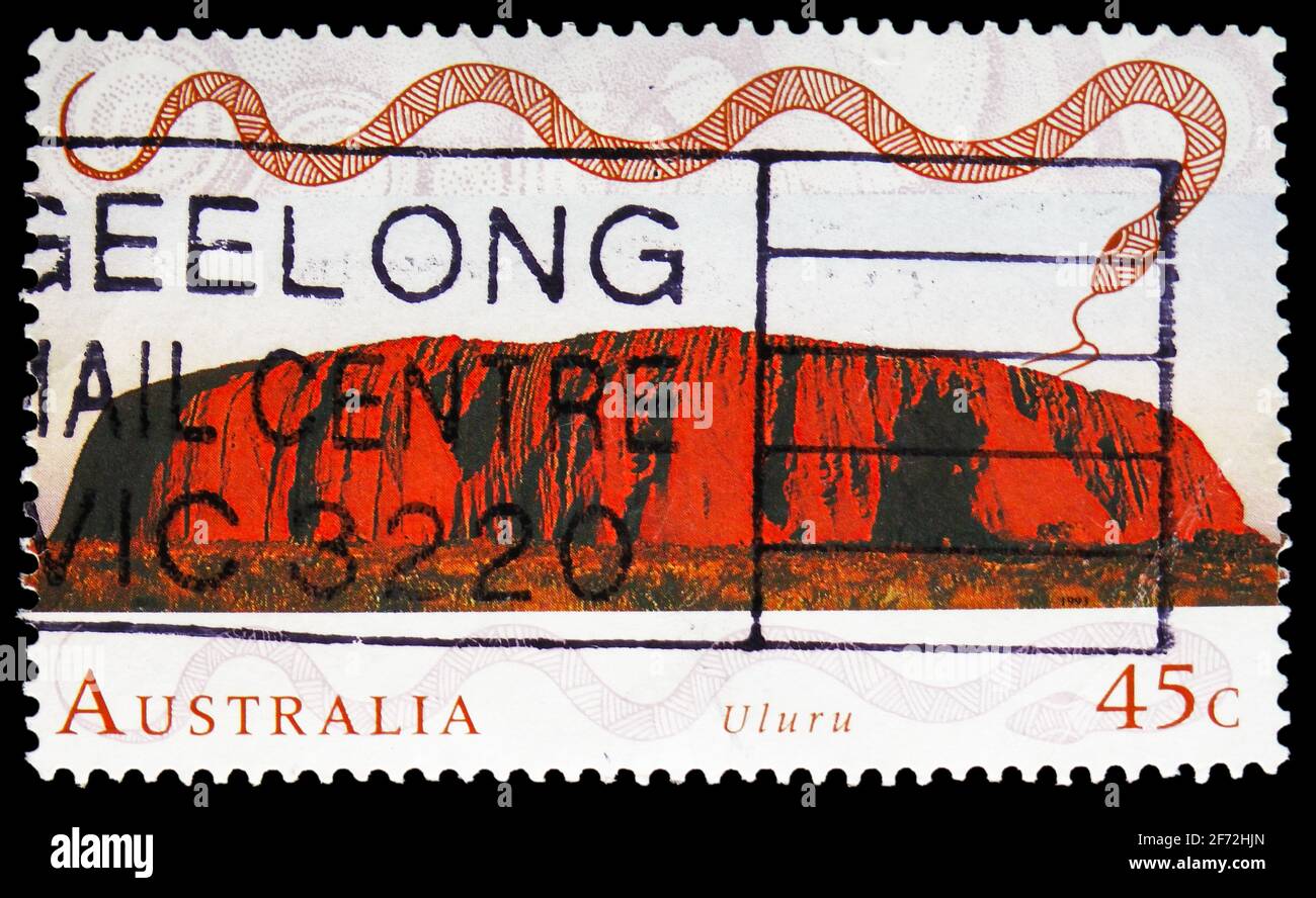 MOSCOW, RUSSIA - DECEMBER 22, 2020: Postage stamp printed in Australia shows Uluru (Ayers Rock), Northern Territory, World heritage Sites serie, circa Stock Photo