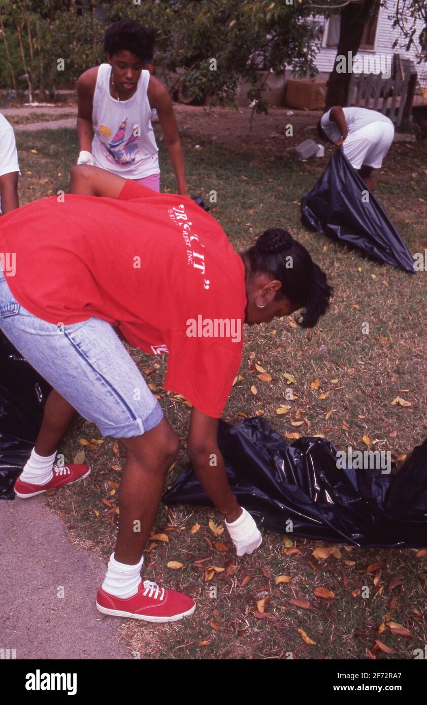 Austin, TX USA Black female college students volunteer during cleanup