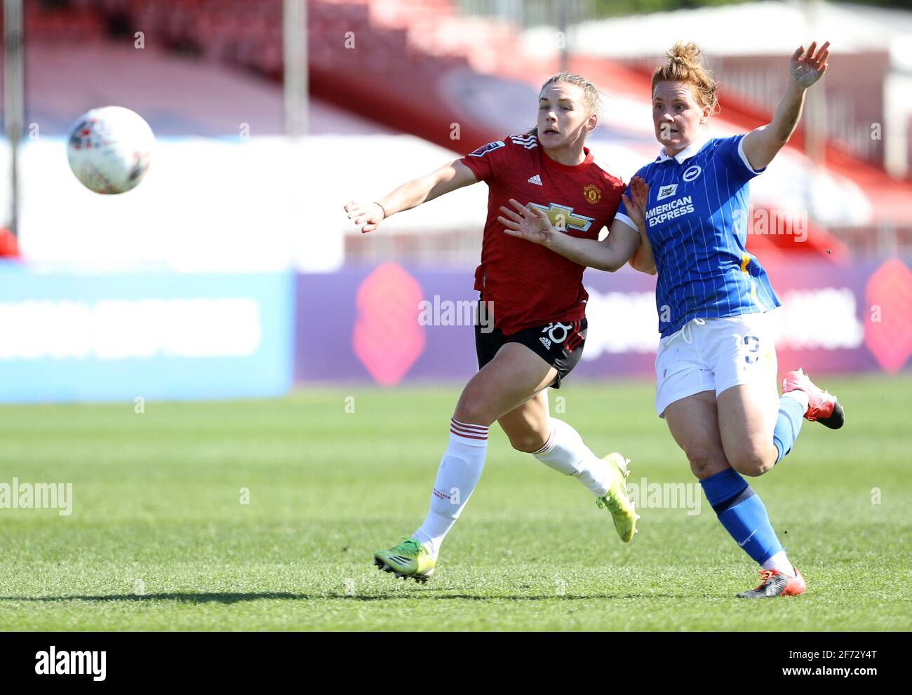 Crawley, UK. 4th Apr, 2021. Felicity Gibbons of Brighton and Hove Albion and Kirsty Hanson of Manchester United during the FA Women's Super League match between Brighton & Hove Albion Women and Manchester United Women at The People's Pension Stadium on April 4th 2021 in Crawley, United Kingdom Credit: Paul Terry Photo/Alamy Live News Stock Photo