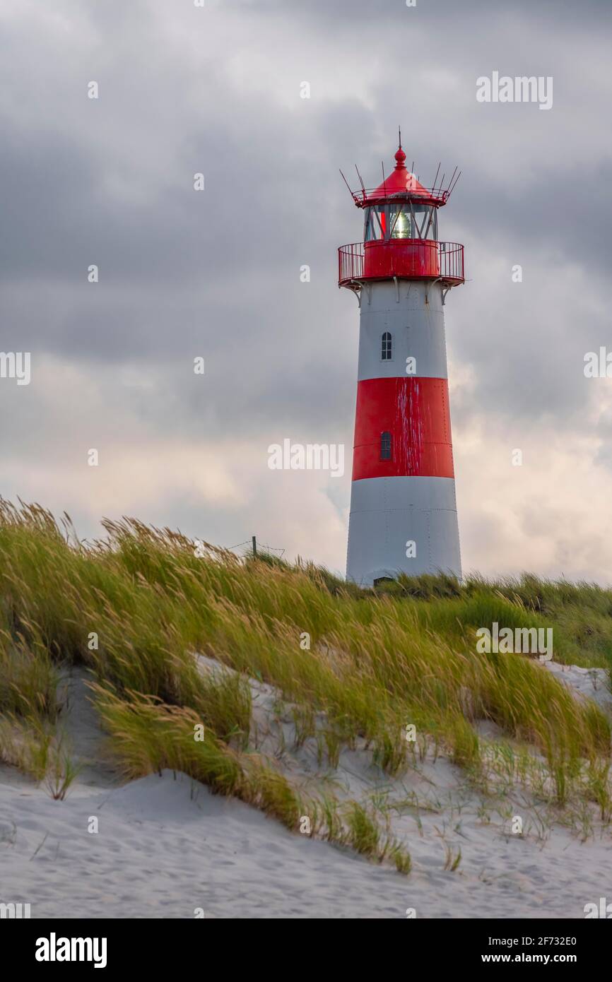 Evening atmosphere, red-white lighthouse List-East in the dunes, elbow, Sylt, North Frisian Island, North Sea, North Frisia, Schleswig-Holstein Stock Photo