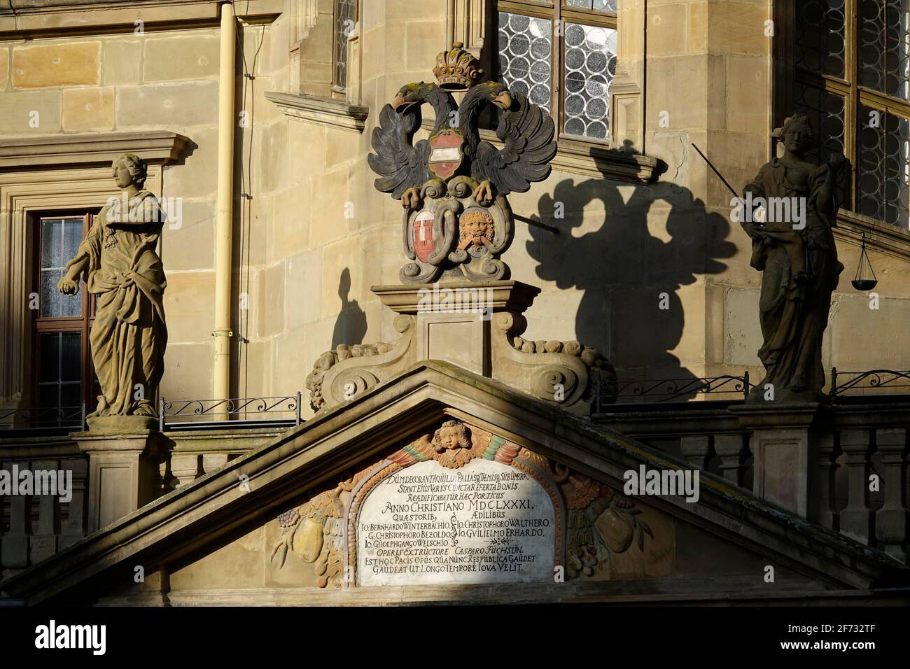 Tympanum or gable above the entrance of the town hall with statues and town coat of arms, Rothenburg ob der Tauber, County Ansbach, Middle Franconia Stock Photo