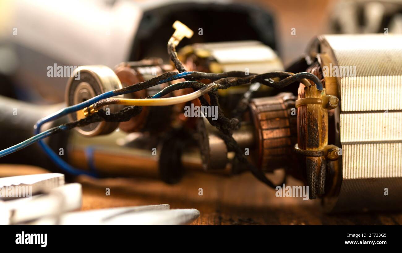 Power tool repair. Details of electrical appliance and repair tools on