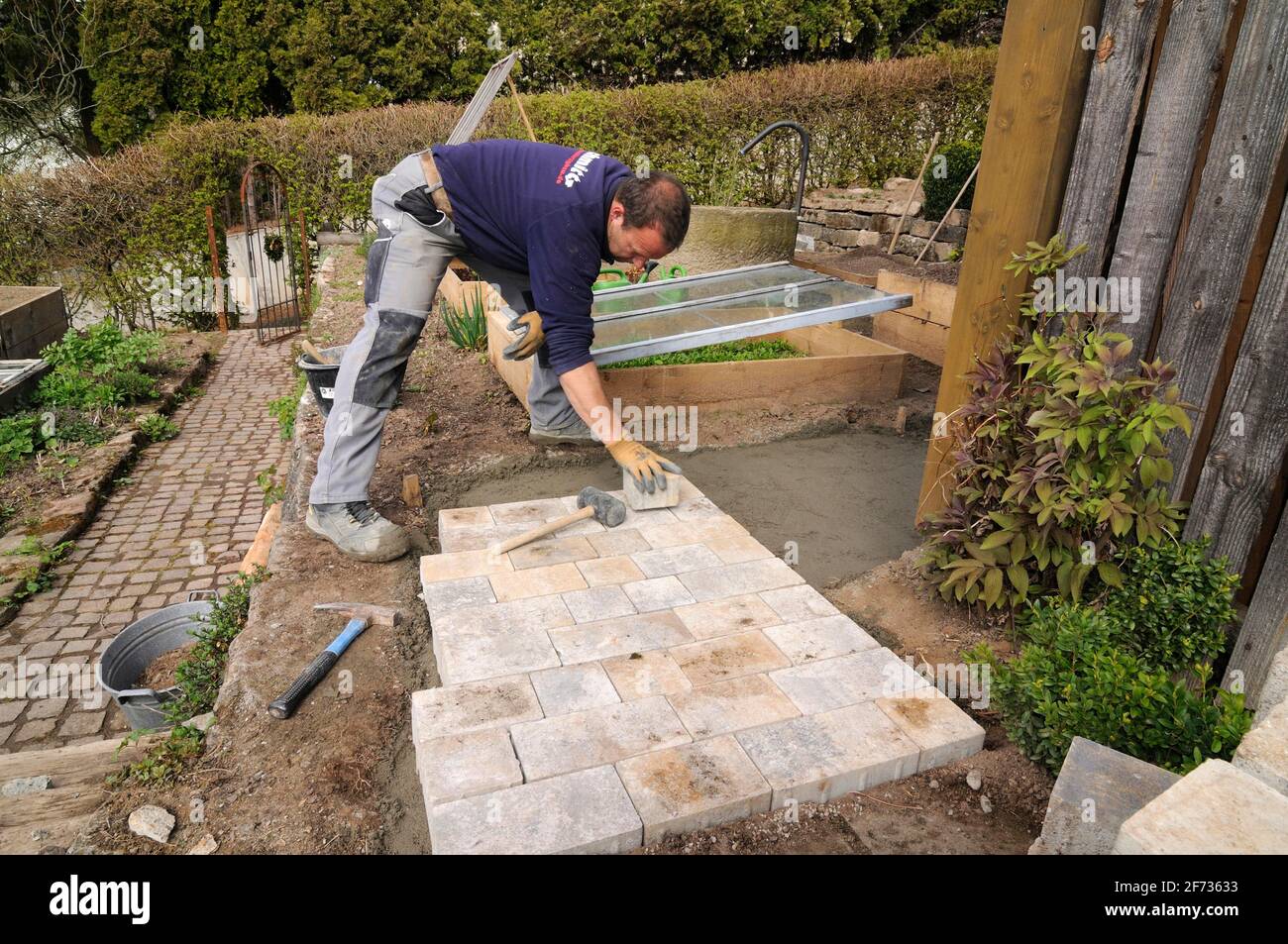 Pave a garden path Stock Photo Alamy