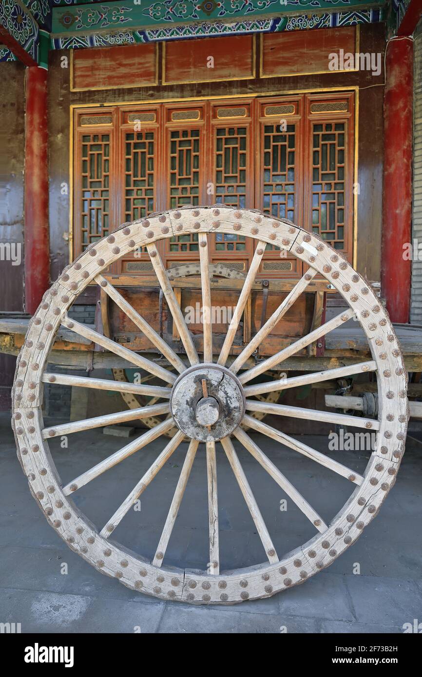 Open-two wheeled-seatless-springless-double pole wooden cart. Dafo Si Great Buddha Temple-Zhangye-Gansu-China-1278 Stock Photo