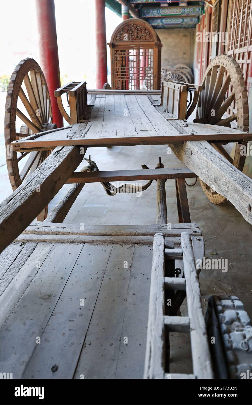 Open-two wheeled-seatless-springless-double pole wooden cart. Dafo Si Great Buddha Temple-Zhangye-Gansu-China-1279 Stock Photo