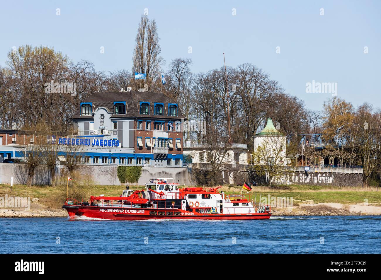 Boat of the fire brigade on the bank of the Rhine river, Duisburg-Homberg, Duisburg, Germany, Europe Stock Photo