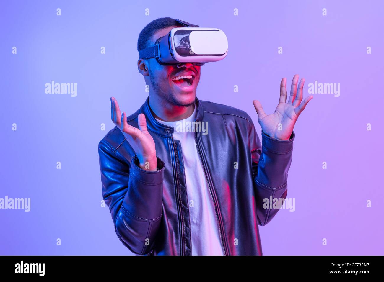 Excited African American Guy In VR Glasses Enjoying Virtual Reality ...