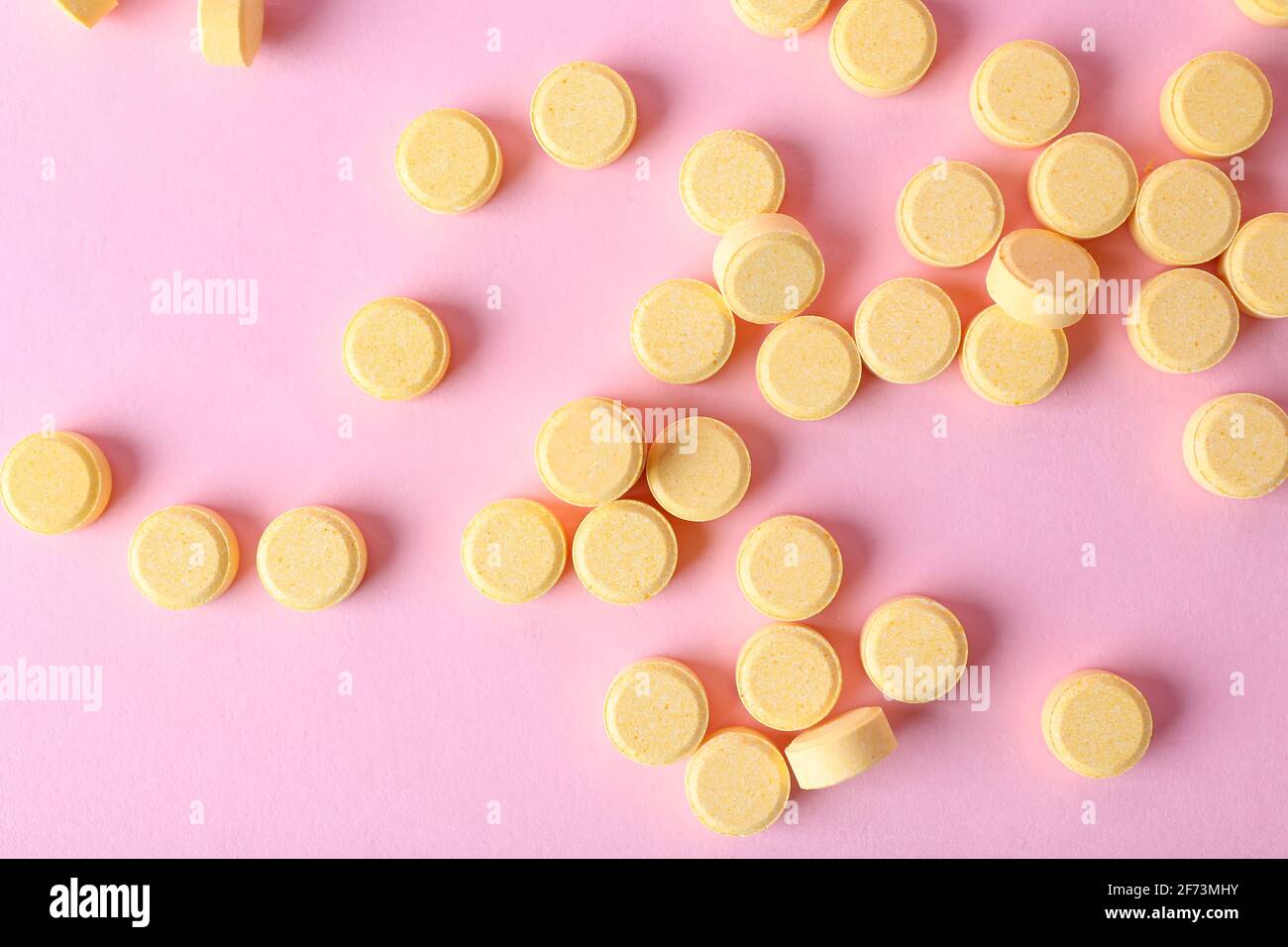 Folic acid pills on color background Stock Photo