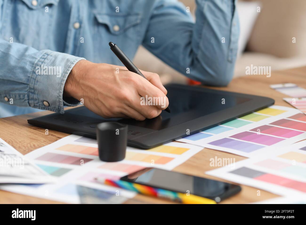 Male designer working in office Stock Photo