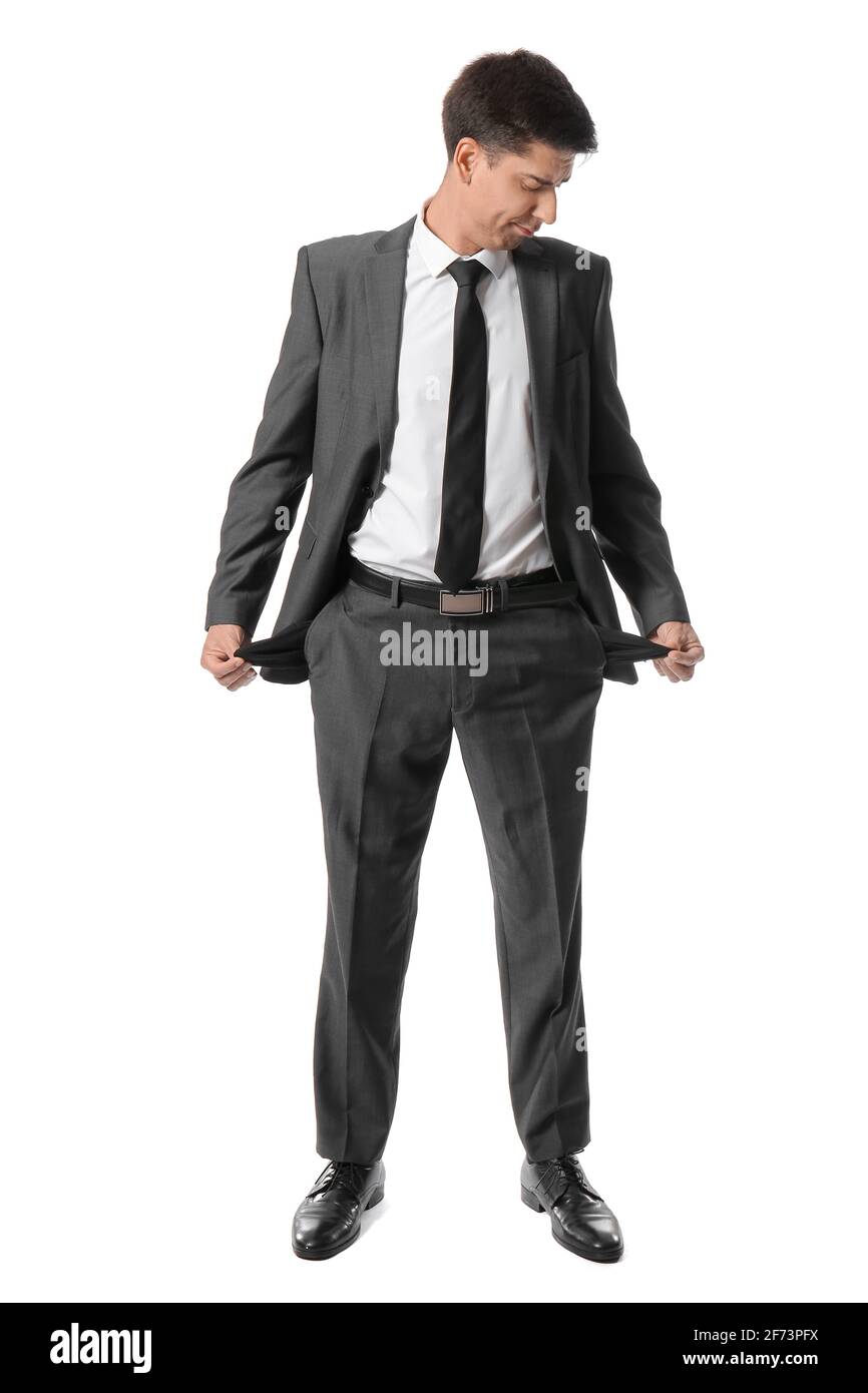 Businessman with empty pockets on white background. Bankruptcy concept Stock Photo