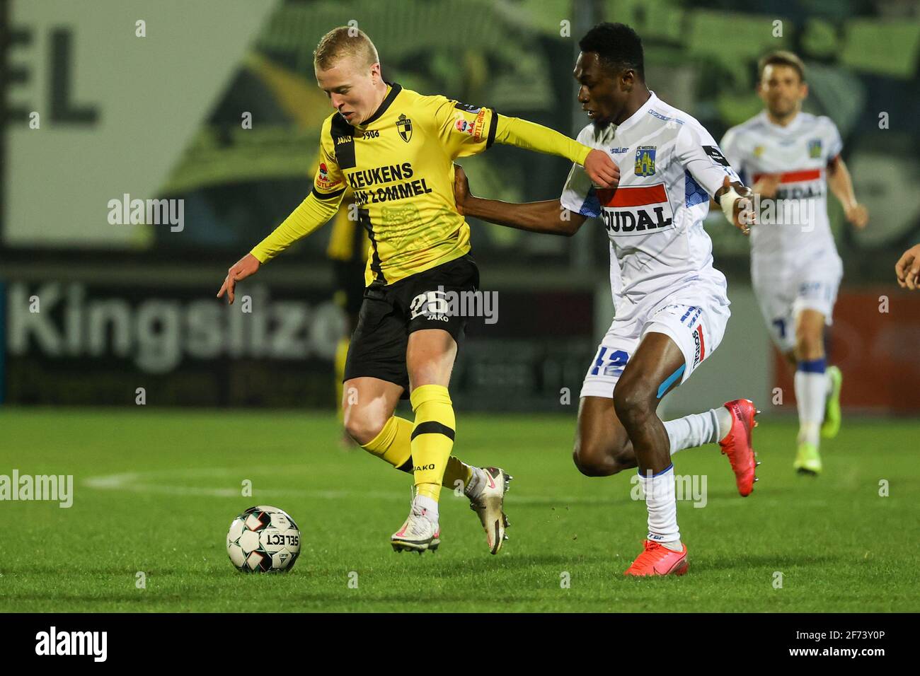 Lierse's Jo Gilis and Westerlo's Guy Yameogo fight for the ball during a soccer match between Lierse Kempenzonen and KVC Westerlo, Sunday 04 April 202 Stock Photo