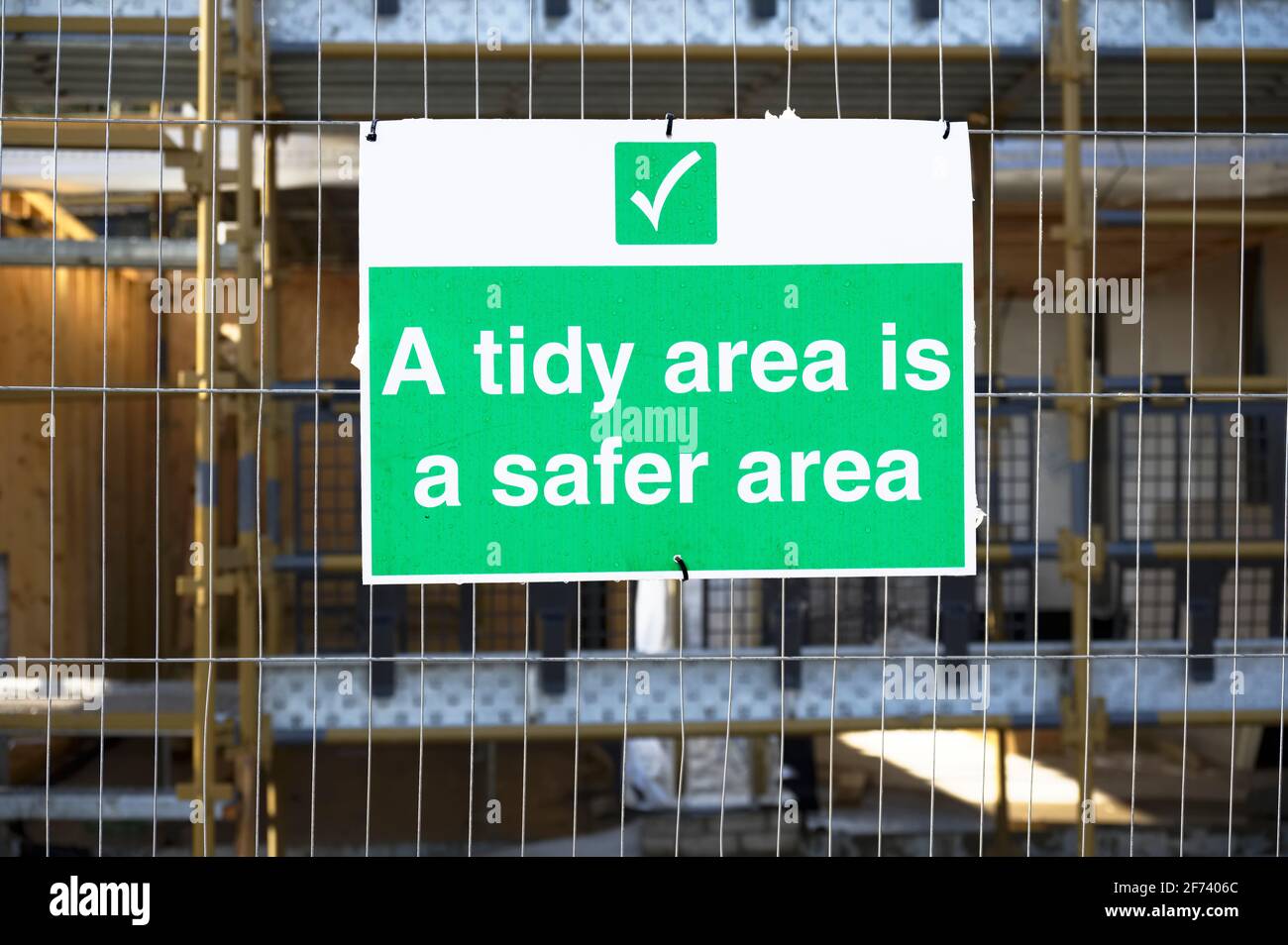 A tidy area is a safe area construction. site safety sign Stock Photo Alamy