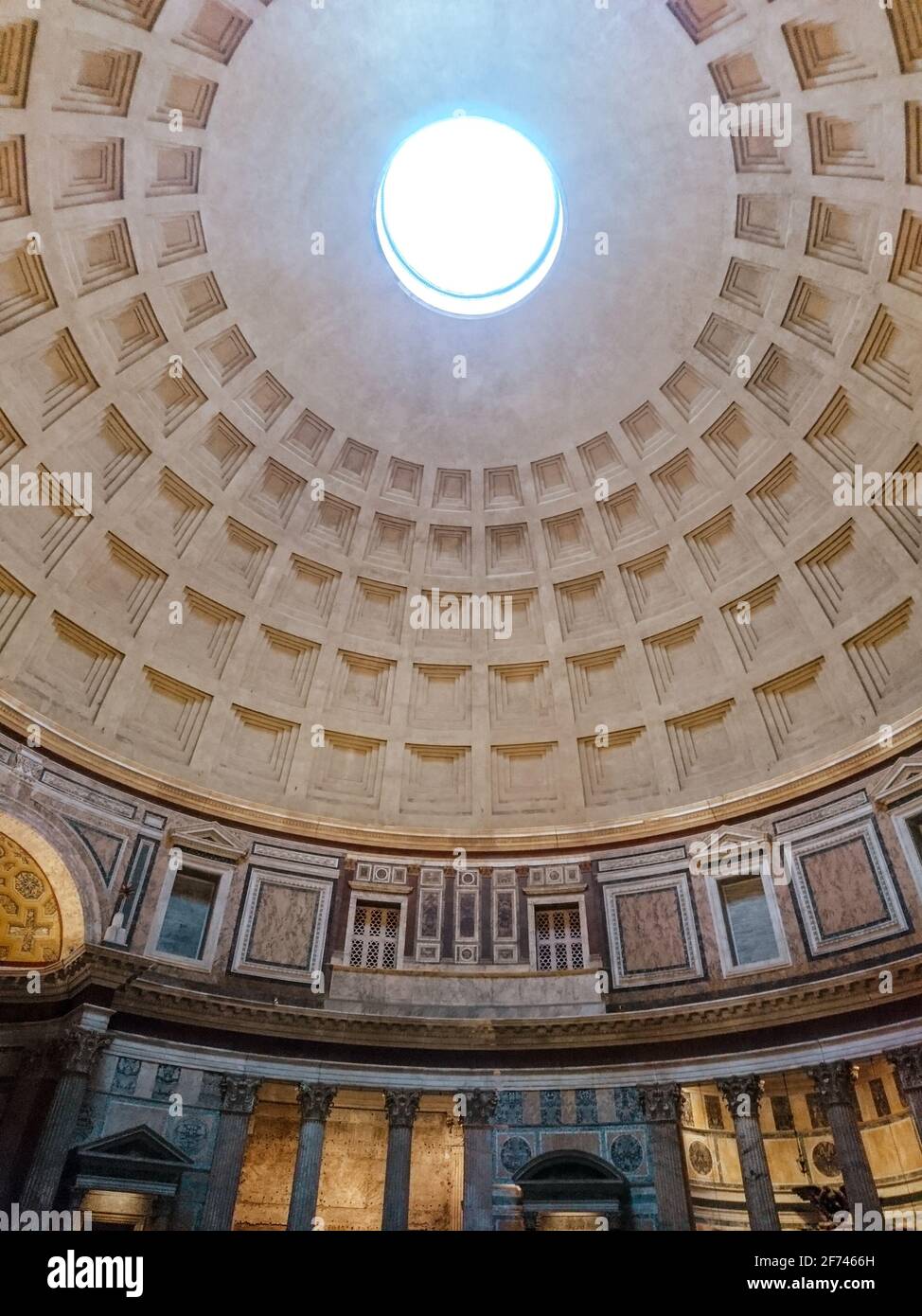 Pantheon oculus in Rome, Italy. Dome open window in roof, interior. Inside  famous antique roman temple with a dome hemisphere and colonnade Stock  Photo - Alamy