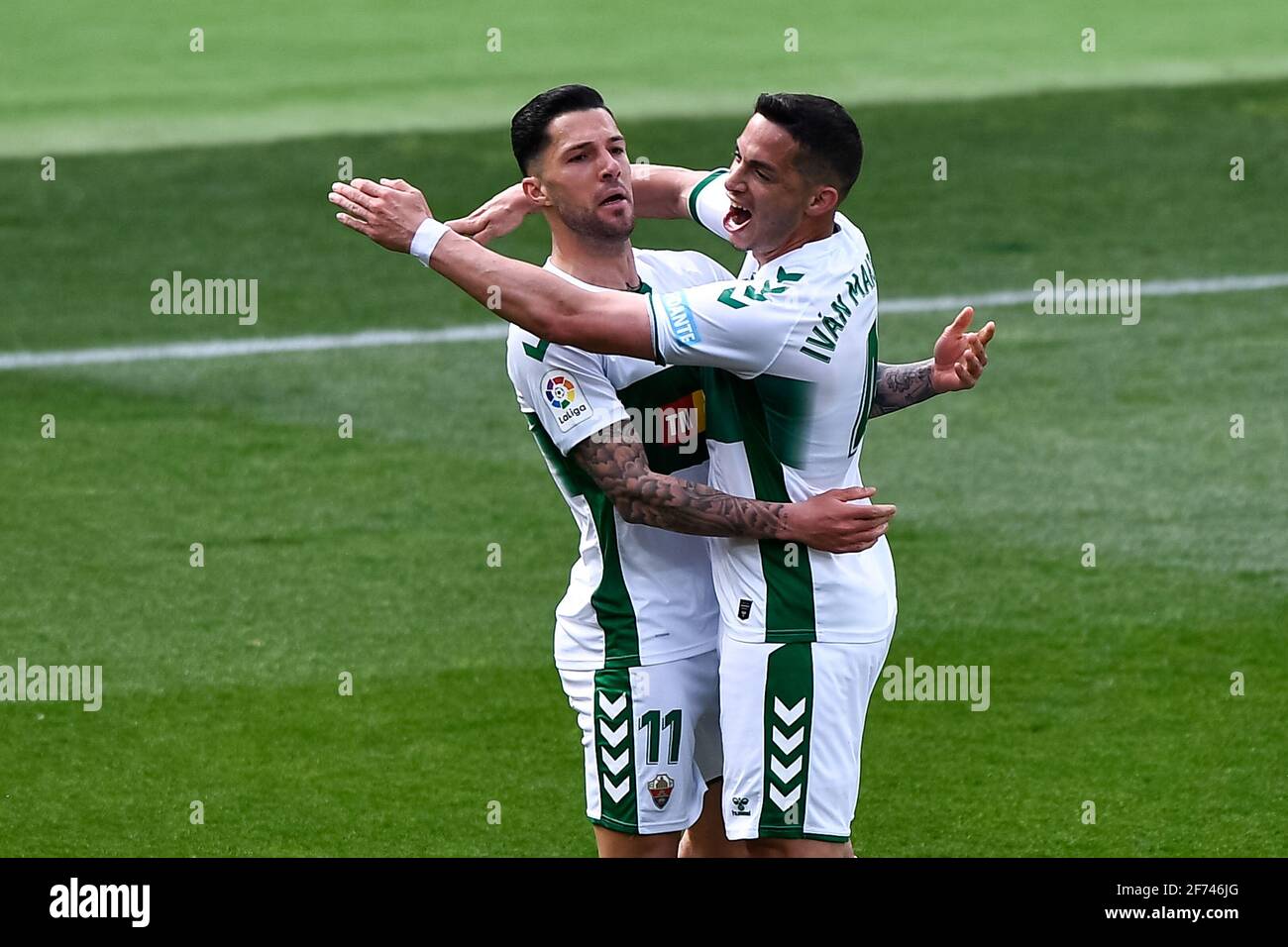 ELCHE, SPAIN - APRIL 4: Tete Morente of Elche CF and Ivan Marcone of Elche CF celebrate their sides first goal during the La Liga Santander match betw Stock Photo