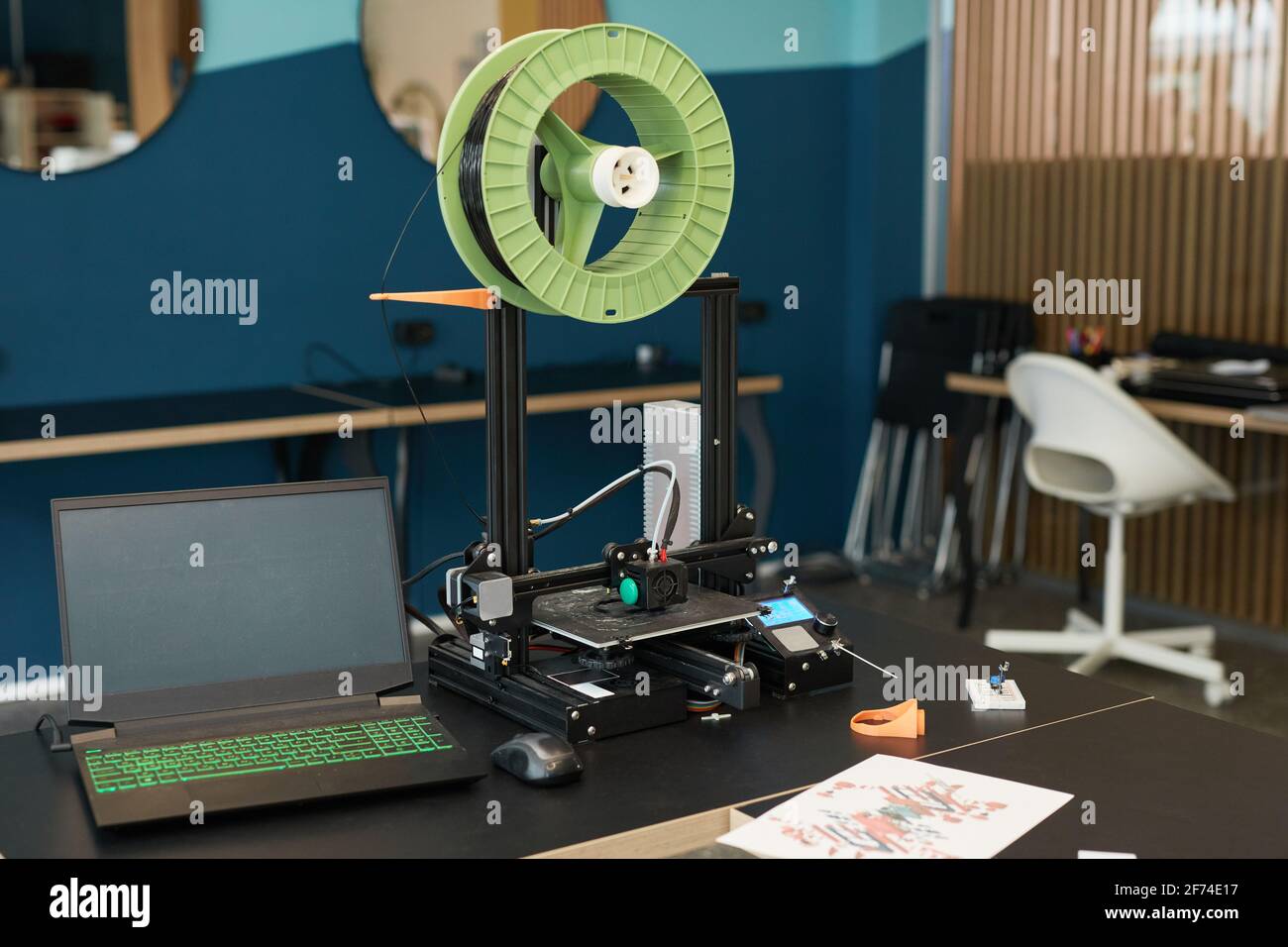 Background image of 3D printer in engineering and robotics lab at modern school, copy space Stock Photo