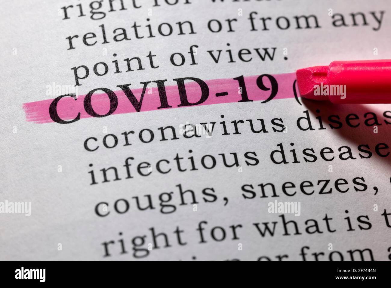 Fake Dictionary, Dictionary definition of COVID-19, Coronavirus disease 2019. Stock Photo