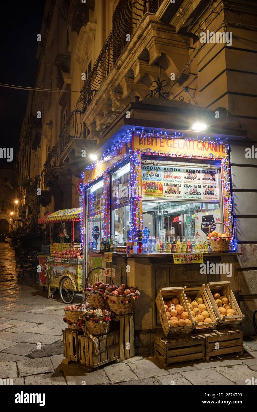 Traditional stall for making fresh fruit juice at streets of Palermo, Sicily Stock Photo