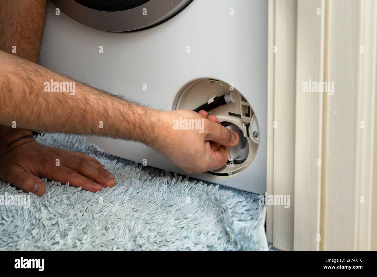 Washing machine filter hi-res stock photography and images - Alamy