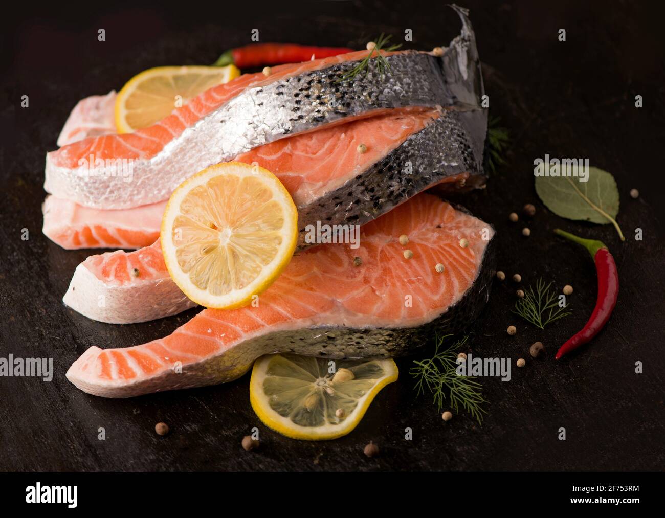 Steak of fresh salmon with aromatic herbs and spices Stock Photo Alamy
