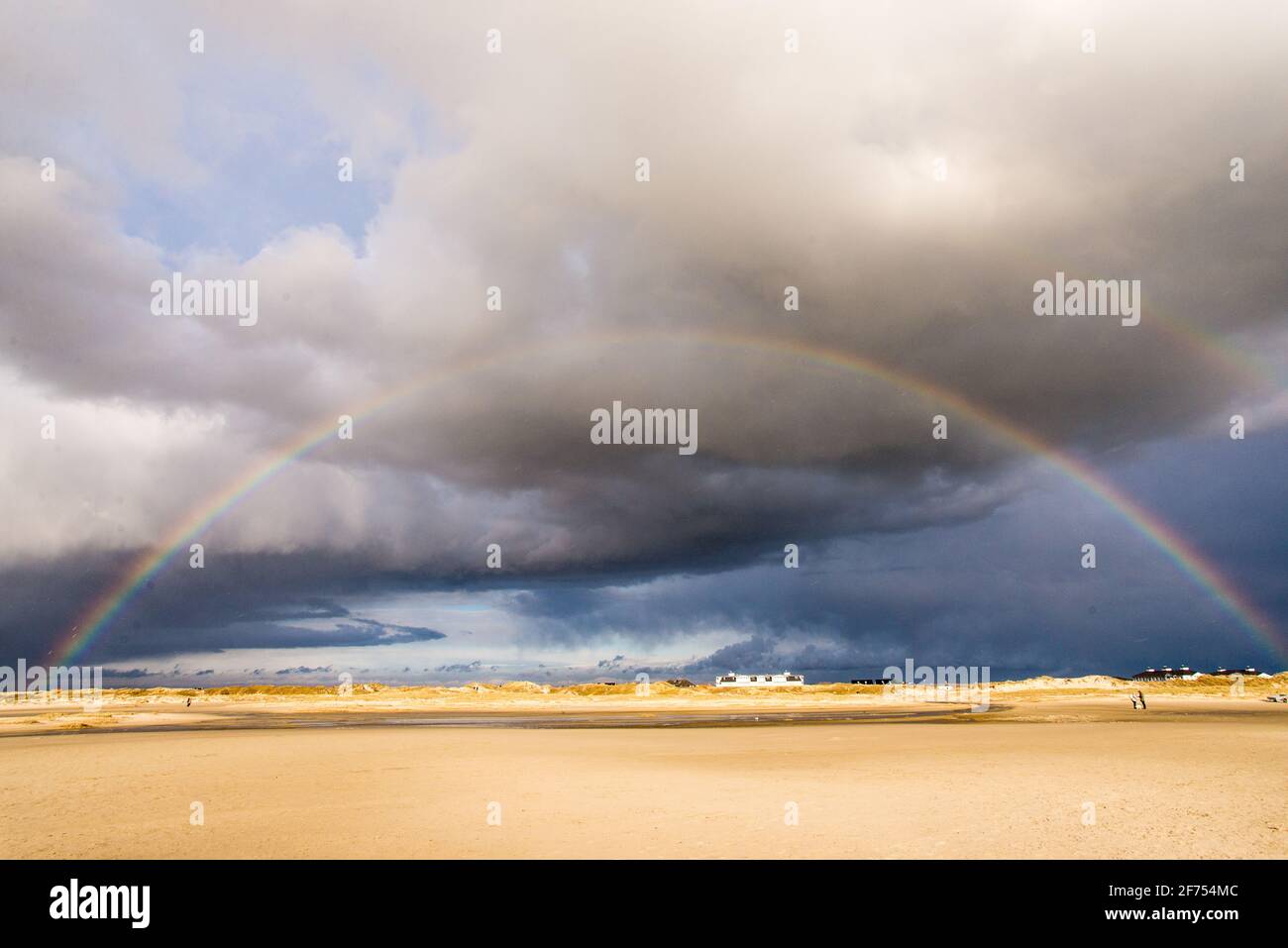 Regenbogen am Strand von St. Peter-Ording - rainbow at St. Peter-Ording beach Stock Photo