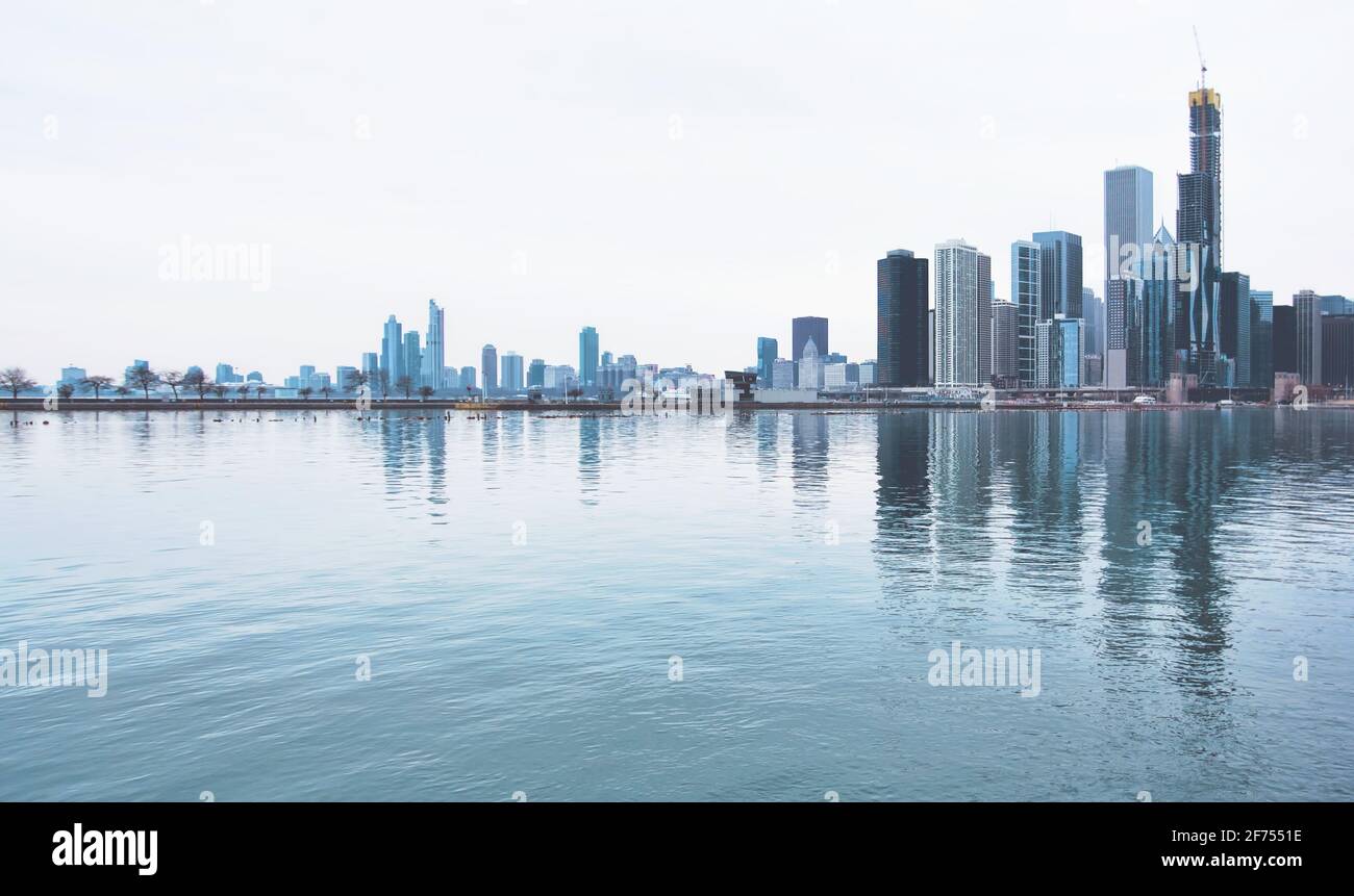 An urban skyline by Lake Michigan as seen from Navy Pier in Chicago, Illinois. Stock Photo