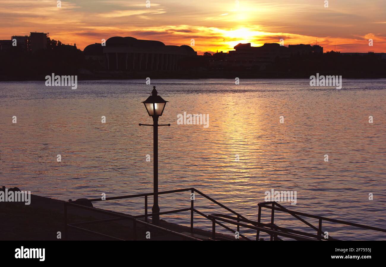 A bright sunset over the water in Ottawa, Canada. Stock Photo