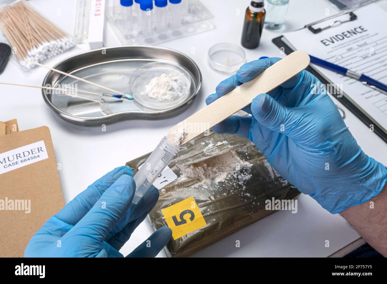 Police investigate positive for drugs in crime lab, conceptual image Stock Photo
