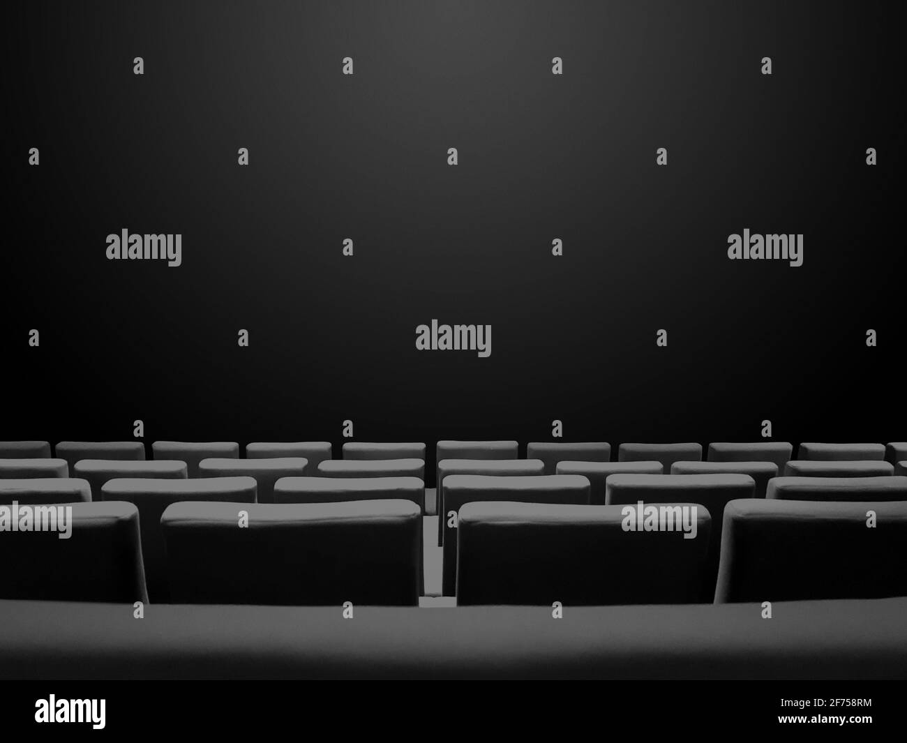 Cinema movie theatre with seats rows and a black copy space background