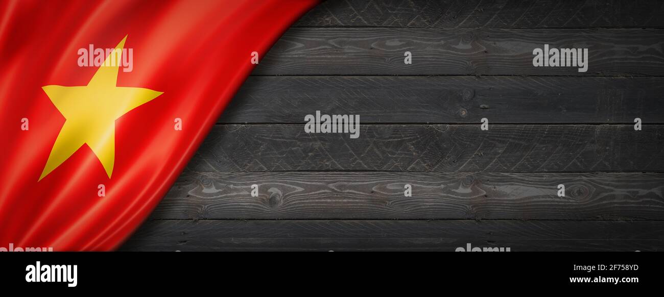 Vietnam flag on black wood wall. Horizontal panoramic banner Stock ...